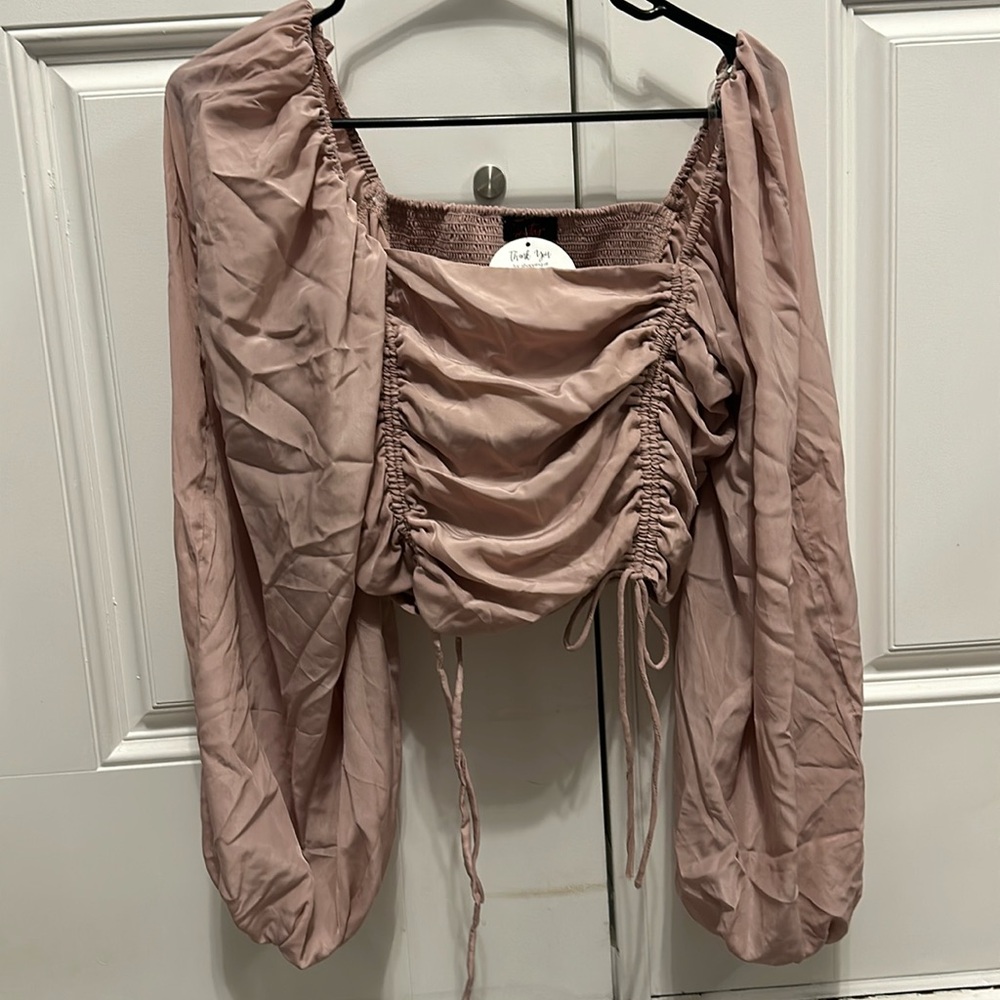NWT Fiestar Top. Size Large. Purchased from Rosie Daze Boutique. Smoke free.